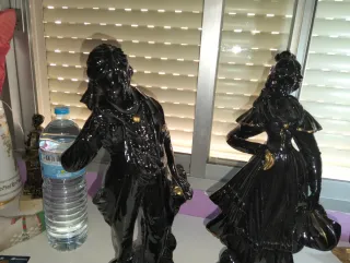 Figuras de lujo antiguas hombre y mujer