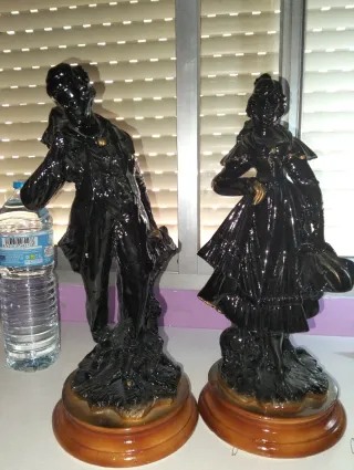 Figuras de lujo antiguas hombre y mujer
