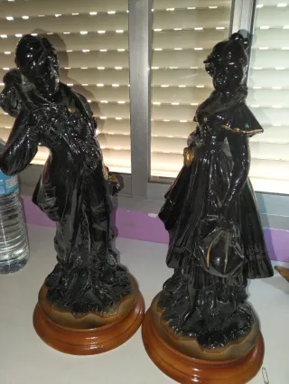 Figuras de lujo antiguas hombre y mujer