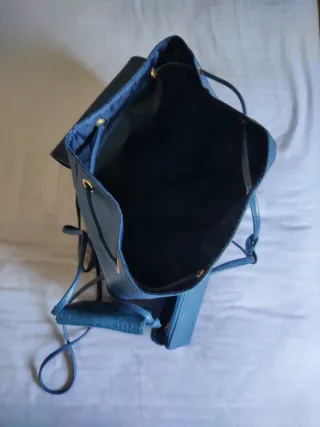 Mochila, monedero y porta móvil azul