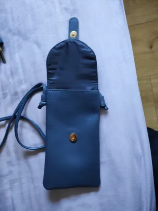 Mochila, monedero y porta móvil azul