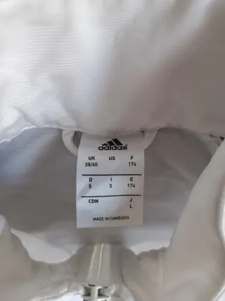 Chaqueta Unisex Adidas Blanca y Negra.