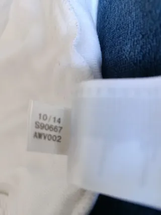 Chaqueta Unisex Adidas Blanca y Negra.