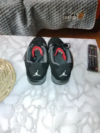 Jordan 4 Retro Negro/Gris