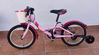 Bicicleta niña rosa con cesta