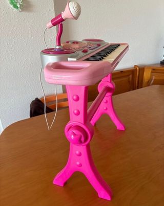 Piano infantil rosa con micrófono