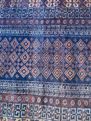 Alfombra de lana artesanal azul y marrón