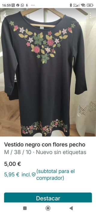 Vestido negro con flores bordadas