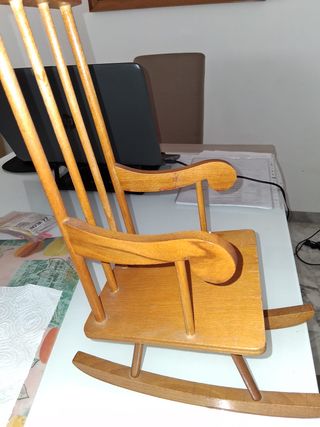 Bambola con dondolo e accessori