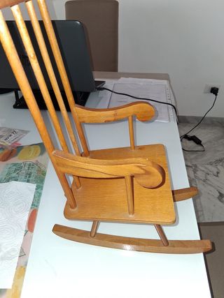 Bambola con dondolo e accessori