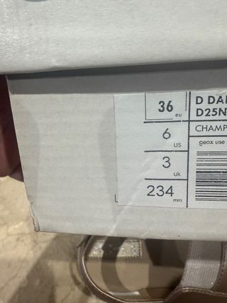 Sandalias doradas mujer