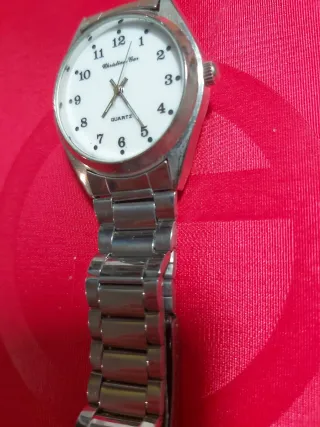 Reloj de Cuarzo. Plata y Blanco