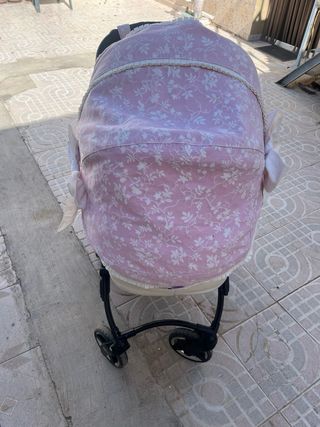 Carro de bebé rosa con capazo silla y portabebes