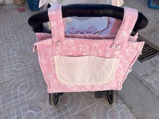 Carro de bebé rosa con capazo silla y portabebes