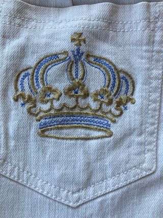 PANTALÓN TEJANO BLANCO CON BORDADOS “ JOCAVI”