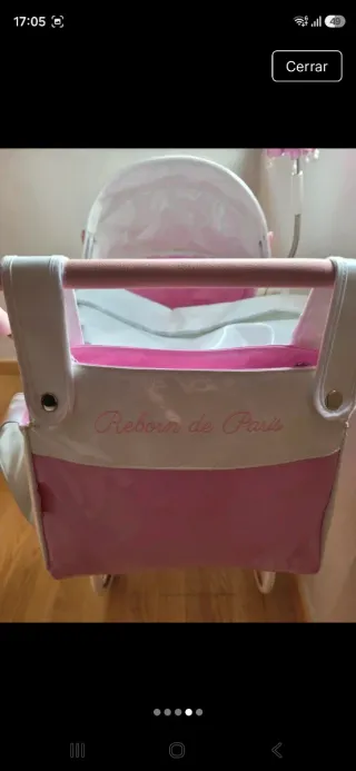 Carrito de muñecas rosa y blanco