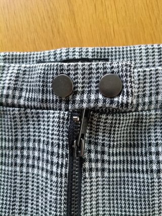 Pantalón de cuadros gris y negro