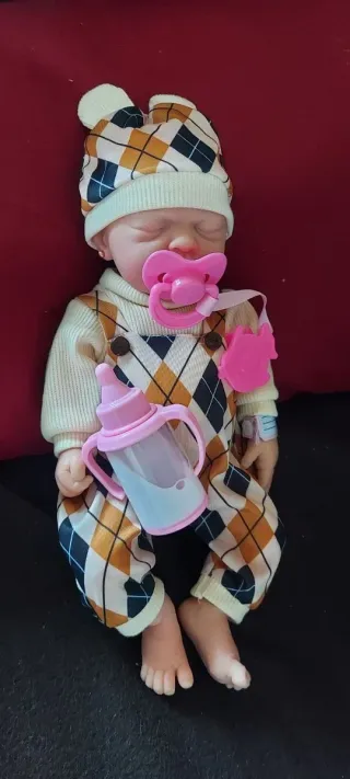 Bebé  reborn silicona niña con chupete