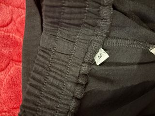 Pantalón negro con cinturón