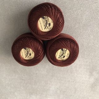 3 ovillos perlé egipcio Presencia marrón