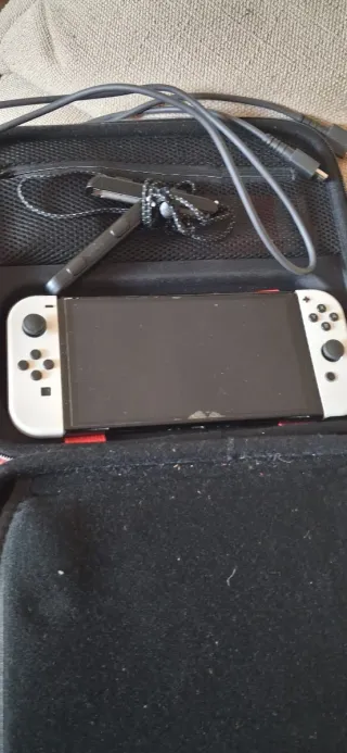 Nintendo Switch OLED blanca Naranja y Morado