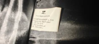 Bolso negro Courrèges Parfums