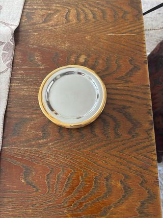 12 Platillos para pan plateados.