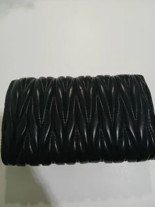 Borsa Miu Miu nera e dorata