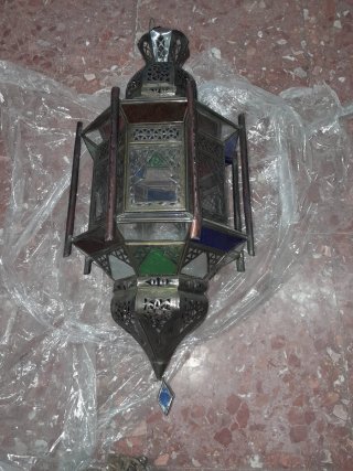 Lámparas de vela de metal y cristal y otras dos
