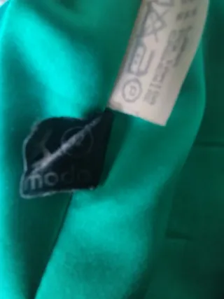 Abrigo verde con detalles de pelo