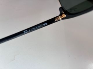 Gafas de sol Ray-Ban Clubmaster negras y doradas