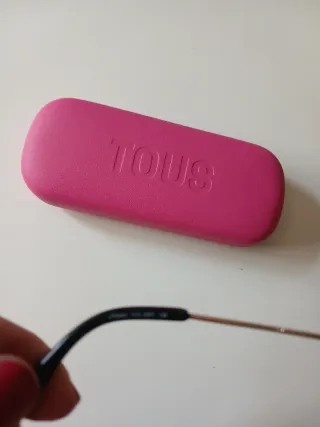 Montura de gafas Tous negra y dorada