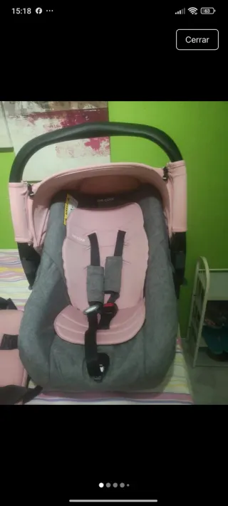 Carro de bebé rosa y gris