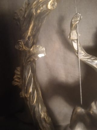 Escultura pareja columpio