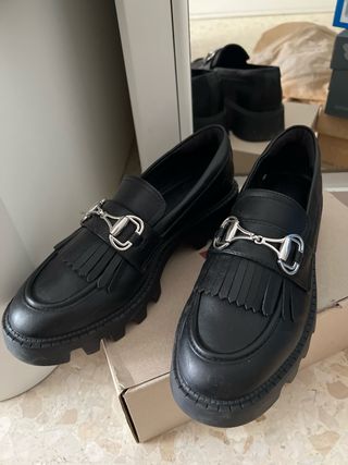Mocasines negros con flecos