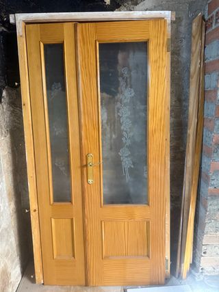 Puerta doble de madera maciza con cristal