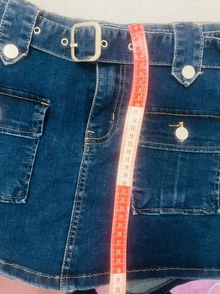 Falda vaquera mini con cinturón