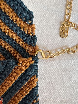 Pochette/porta telefono fatta all’uncinetto a mano