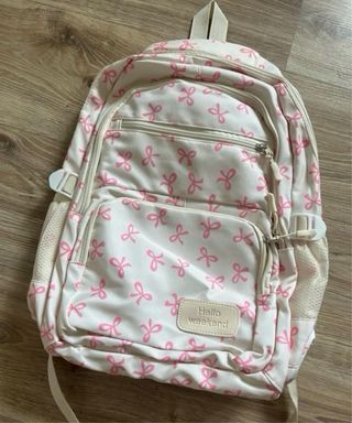 Pack mochila y 2 accesorios crema y rosa