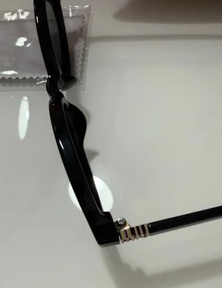 Occhiali da sole Miu Miu neri ovali