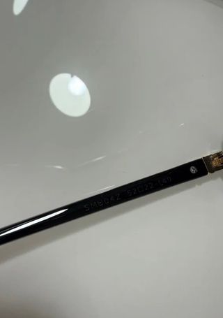 Occhiali da sole Miu Miu neri ovali