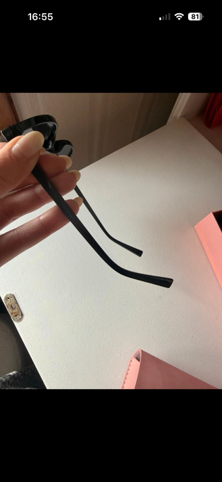 Occhiali da sole Miu Miu neri ovali