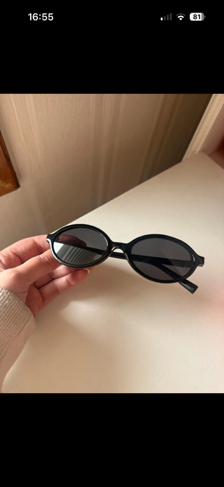 Occhiali da sole Miu Miu neri ovali