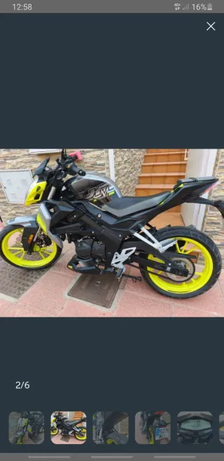 Moto Negra/Gris y amarilla