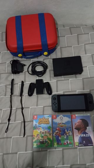 Nintendo Switch + Accesorios y Juegos