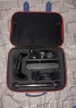 Nintendo Switch + Accesorios y Juegos