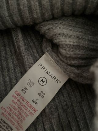 Jersey gris de punto con cremallera