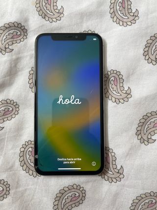 iPhone X Plata Batería 97% leer anuncio.