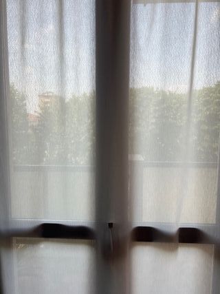 Tenda bianca per finestre