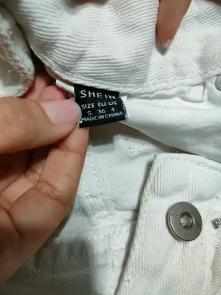 Pantaloncini donna bianchi strappati